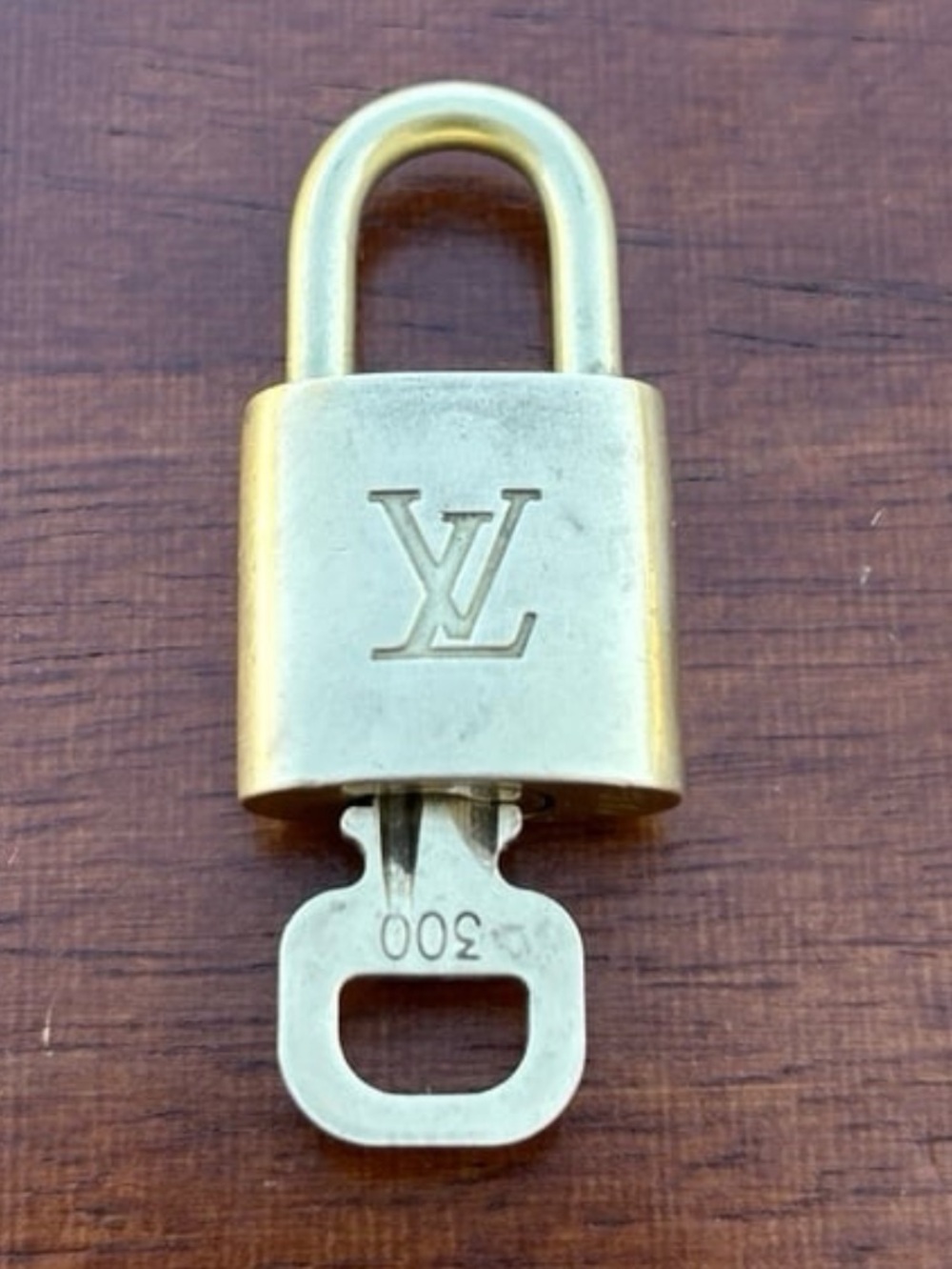 Gold Louis Vuitton w/ key #300